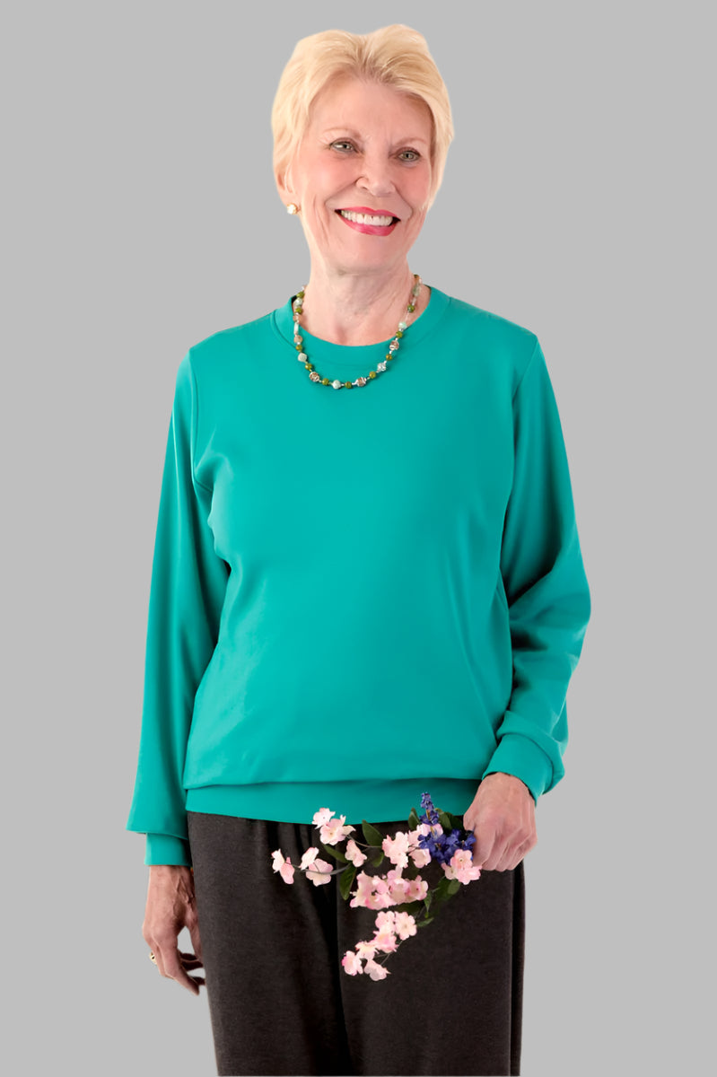 Women's Long Sleeve Banded Bottom Top by Buck & Buck, and available in different sizes. This tops item is part of our blouses collection.