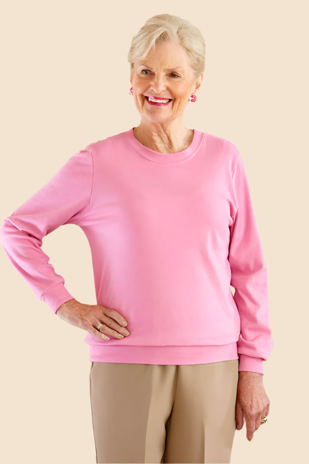Women's Long Sleeve Banded Bottom Top by Buck & Buck in Rose, and available in different sizes. This tops item is part of our blouses collection.