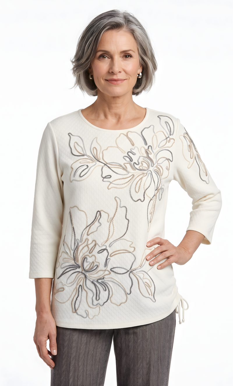 The women's everyday knit top  by Alfred Dunner in cream and available in different sizes. This top is part of our women's blouses  collection.