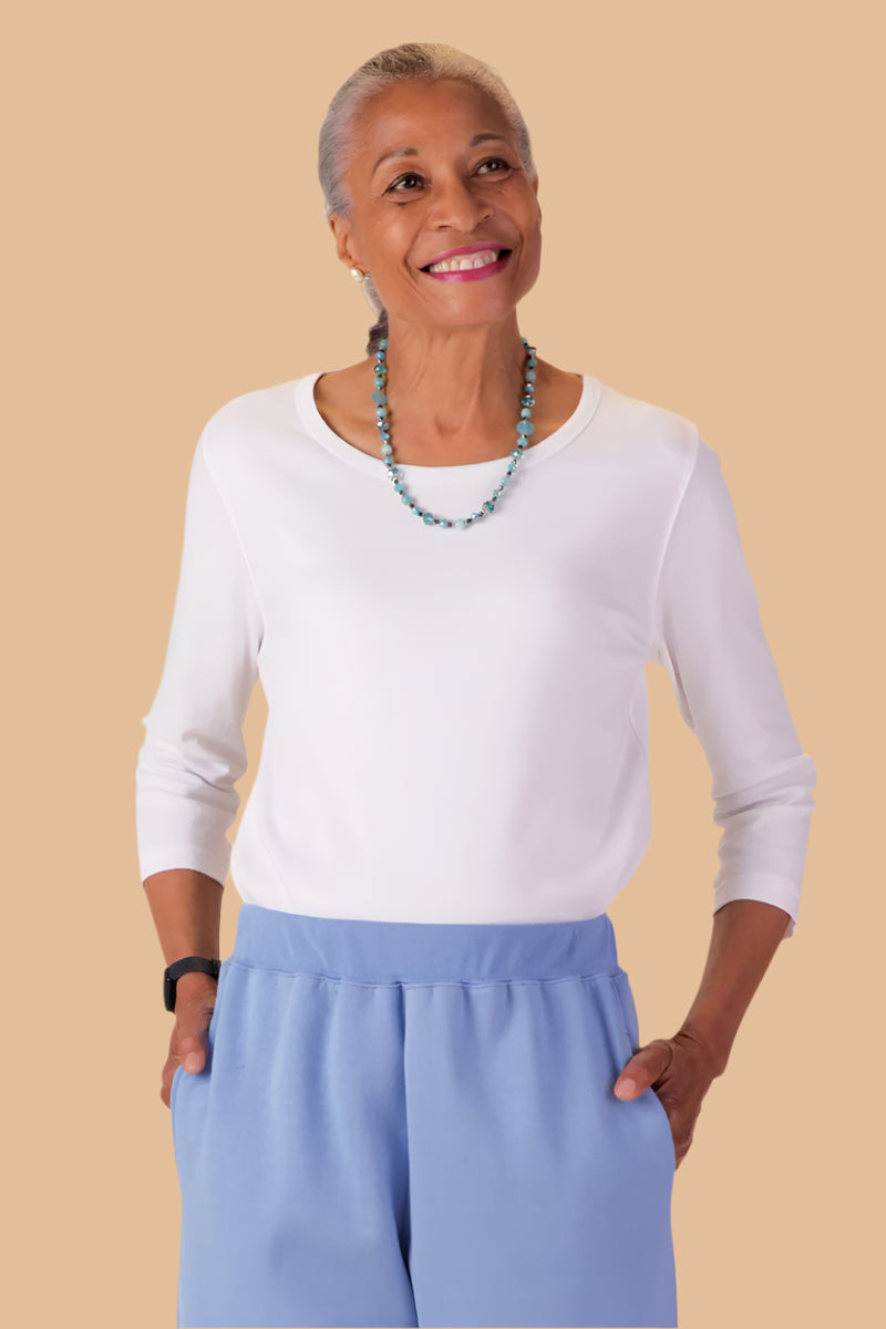 3/4 Sleeve Scoop Neck Top for women by Buck & Buck in White, and available in different sizes. This tops item is part of our blouses collection.
