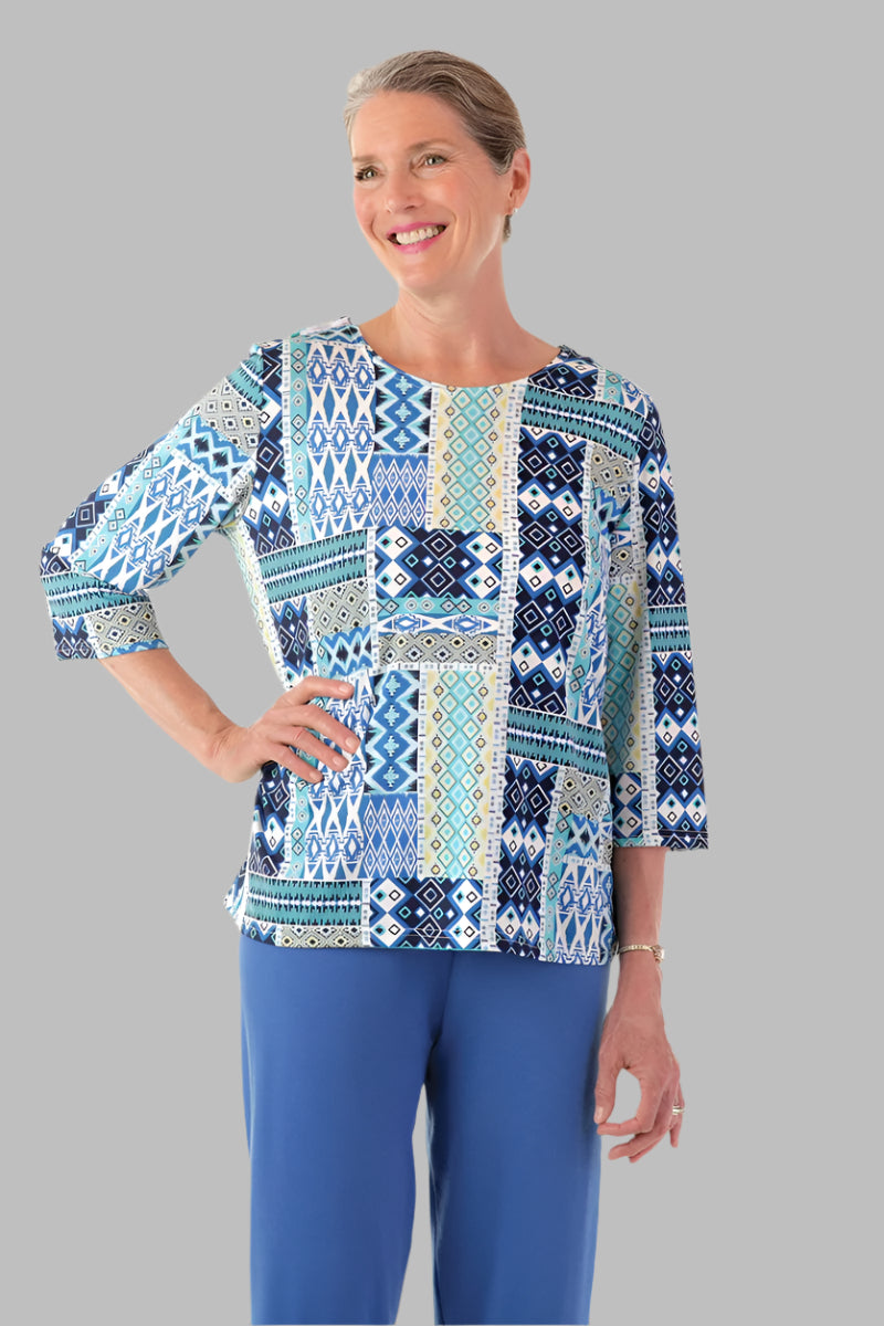 Poly Wrap Back Round Neck Blouse for women by Buck & Buck, and available in different sizes. This tops item is part of our blouses collection.
