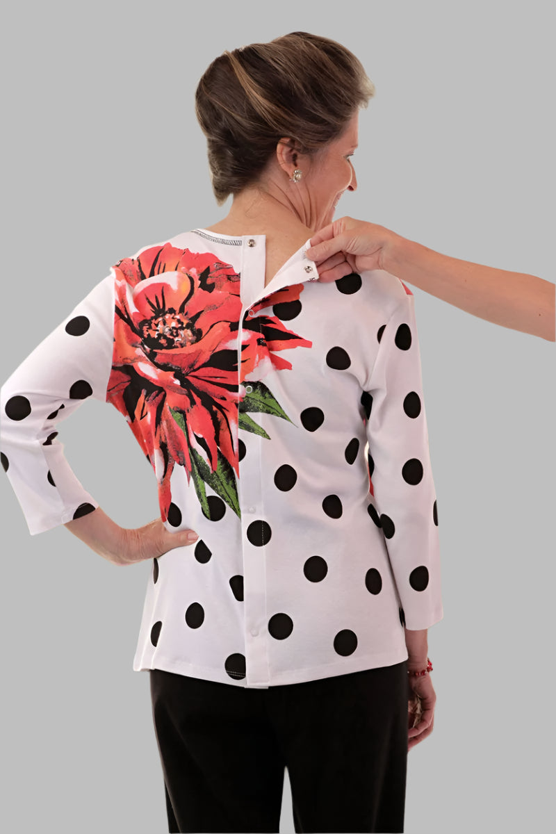 Snap Back Block Printed Knit Top for women by Buck & Buck in Black, and available in different sizes. This tops item is part of our blouses collection.