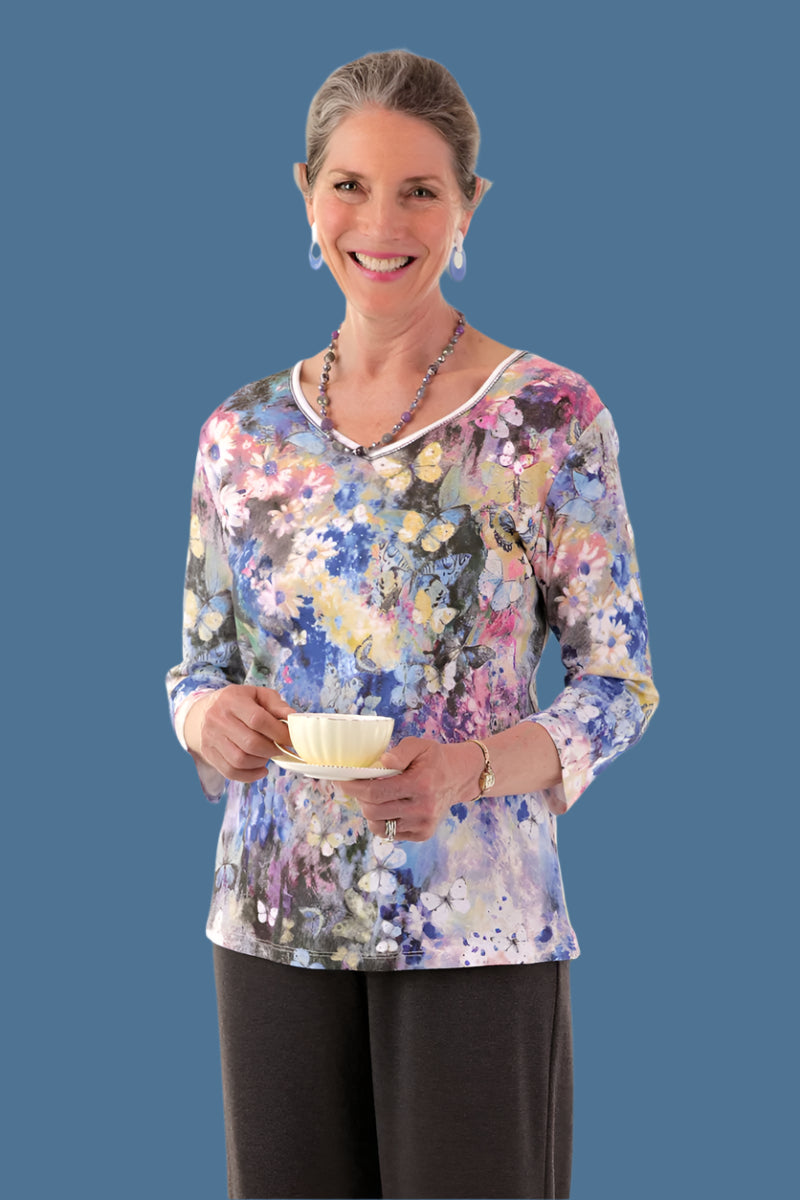 Snap Back Block Printed Knit Top for women by Buck & Buck in Black, and available in different sizes. This tops item is part of our blouses collection.