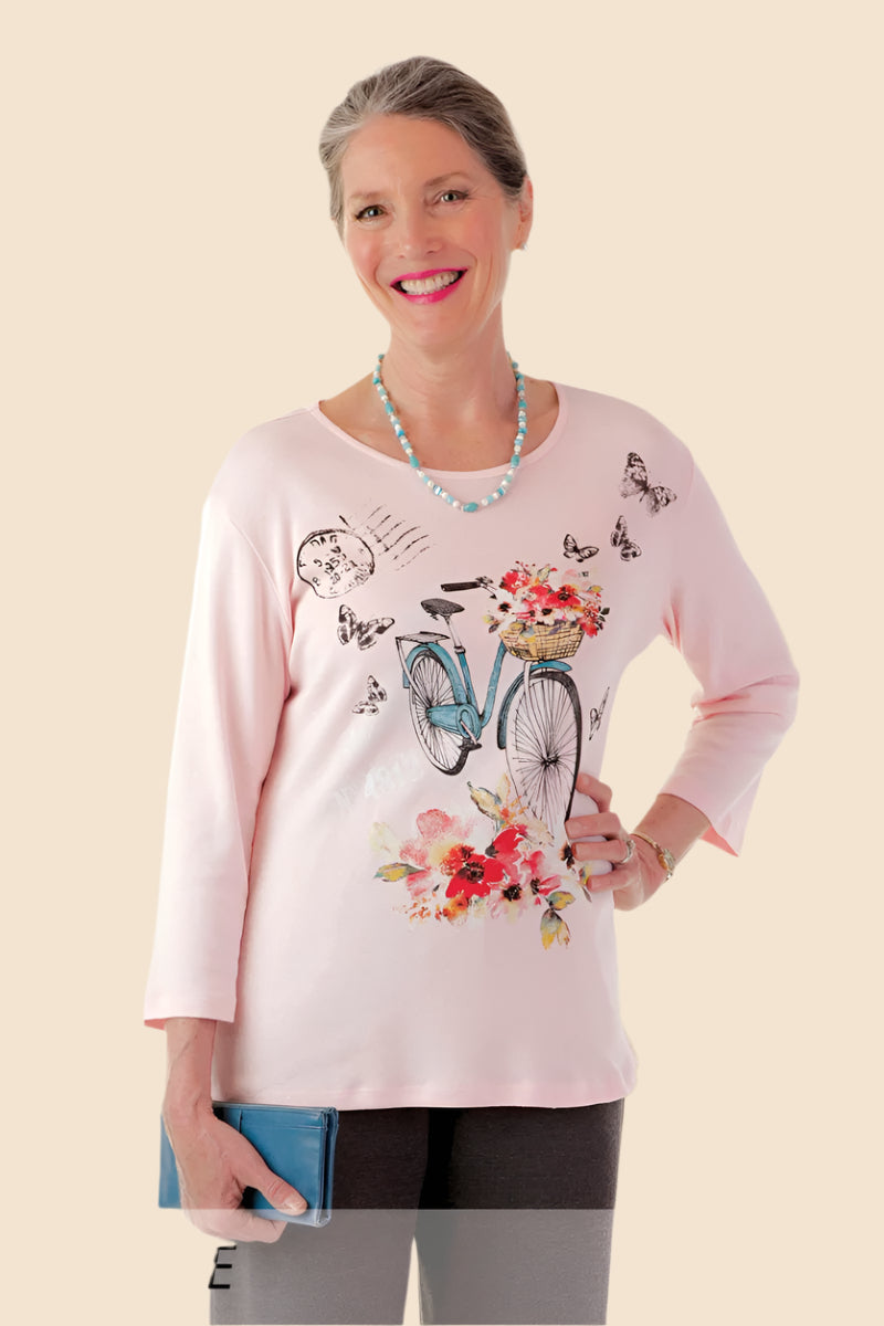 Snap Back Block Printed Knit Top for women by Buck & Buck in Pink, and available in different sizes. This tops item is part of our blouses collection.