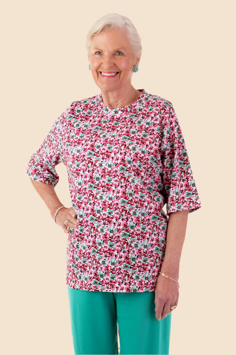 Short Sleeve Wrap Back Printed Knit Top for women by Buck & Buck, and available in different sizes. This tops item is part of our blouses collection.