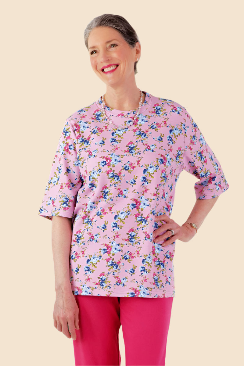 Short Sleeve Wrap Back Printed Knit Top for women by Buck & Buck in Red, and available in different sizes. This tops item is part of our blouses collection.