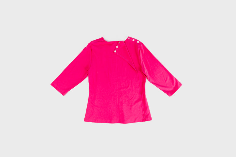 Women's Wrap Back Tunic by Buck & Buck in pink, and available in different sizes. This wrap back item is part of our tops collection.