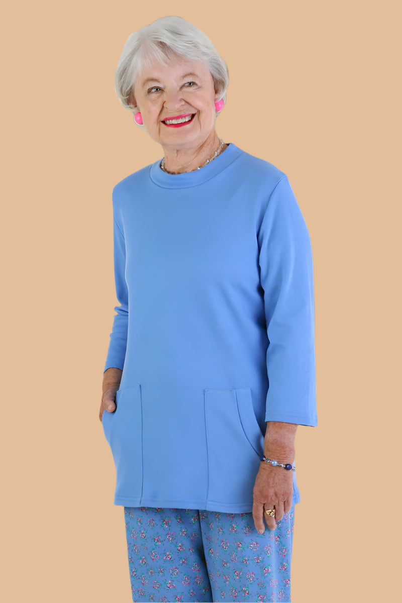 Solid Knit Top With Pockets for women by Buck & Buck in Turquoise, and available in different sizes. This tops item is part of our blouses collection.