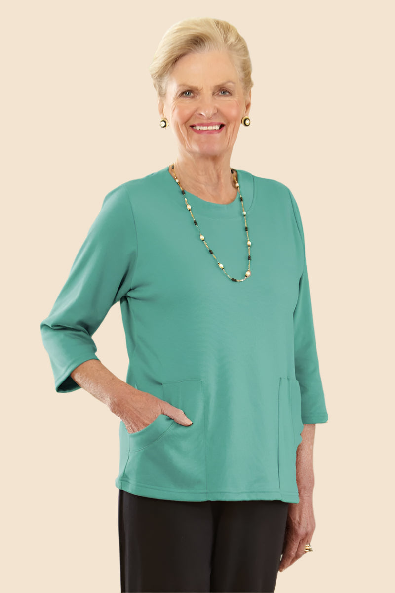 Solid Knit Top With Pockets for women by Buck & Buck, and available in different sizes. This tops item is part of our blouses collection.