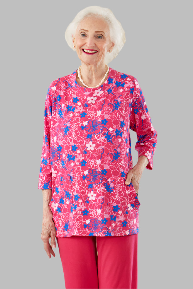 Printed Knit Top With Pockets for women by Buck & Buck in Red, and available in different sizes. This tops item is part of our tunics collection.