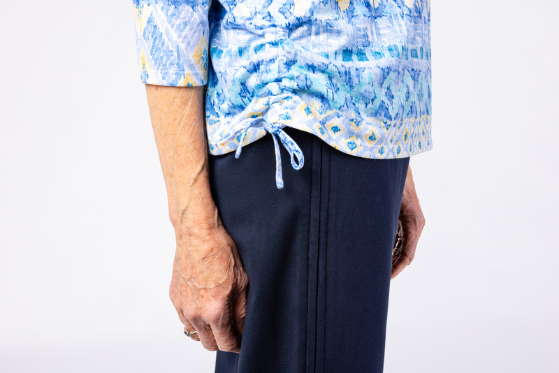 Women’s Detail Easy Fit Top by Alfred Dunner in Blue, and available in different sizes. This top item is part of our blouses collection.