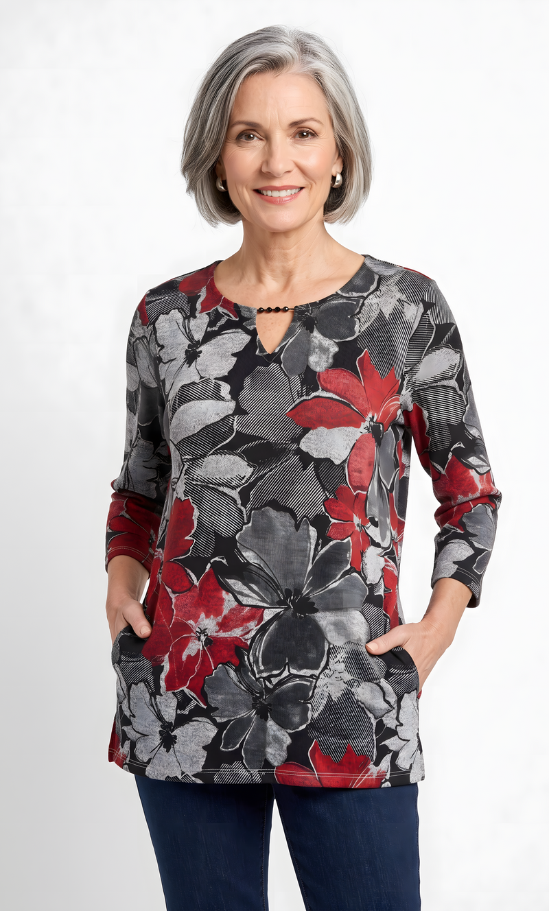 Women’s Detail Easy Fit Top by Alfred Dunner in Dark Floral, and available in different sizes. This top item is part of our blouses collection.