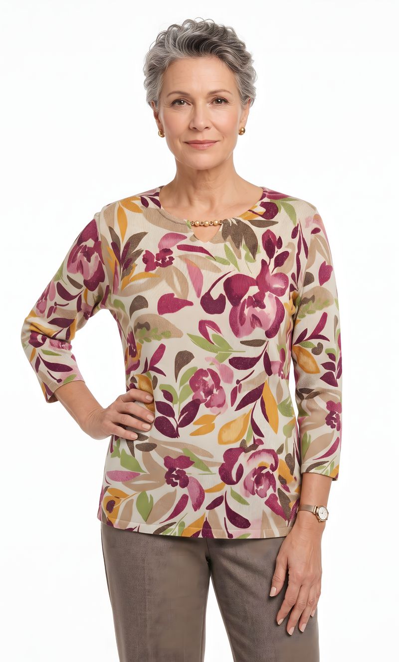Women’s Detail Easy Fit Top by Alfred Dunner in purple, and available in different sizes. This top item is part of our blouses collection.