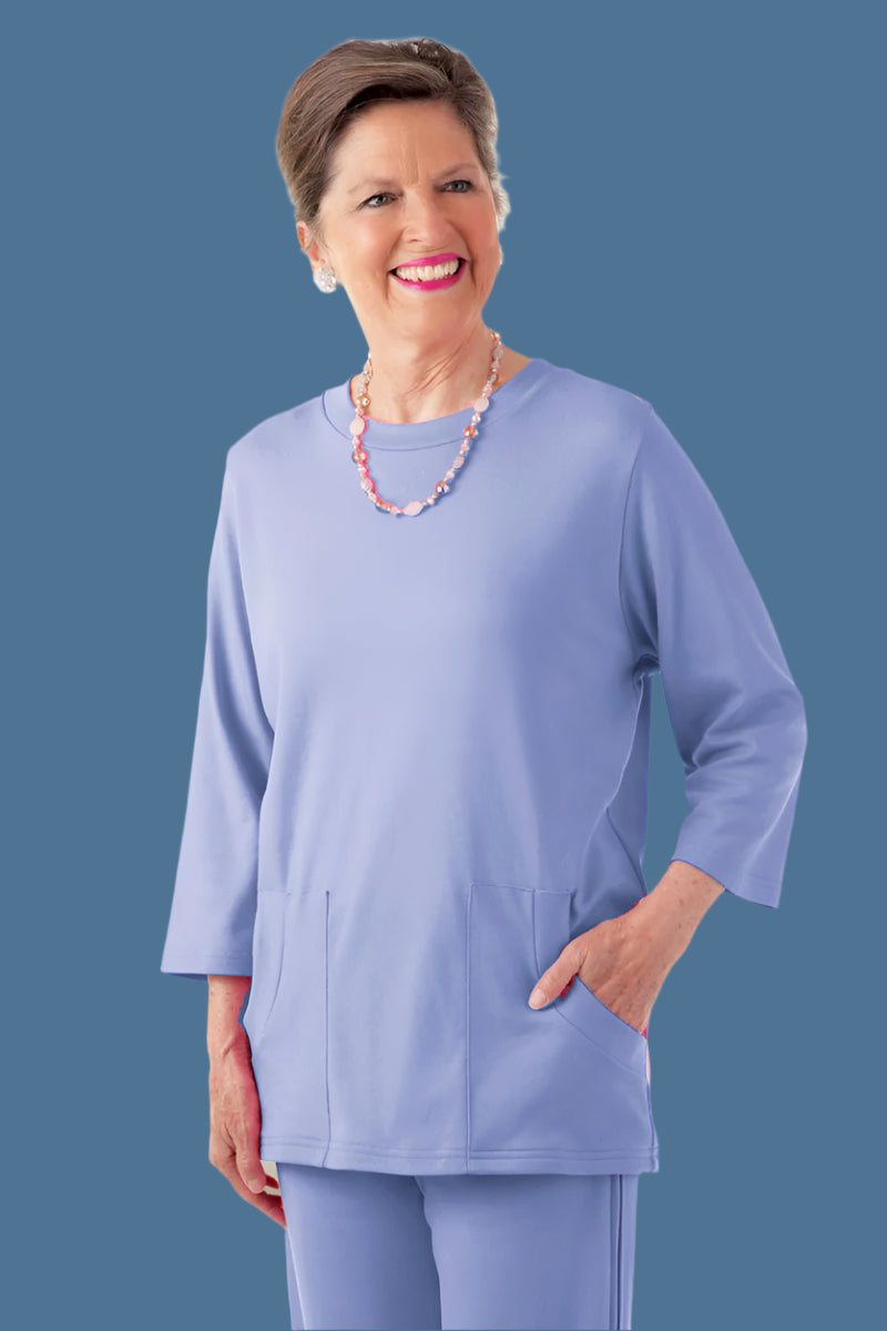 Solid Moon Pocket Wrap Back Top for women by Buck & Buck, and available in different sizes. This tops item is part of our blouses collection.