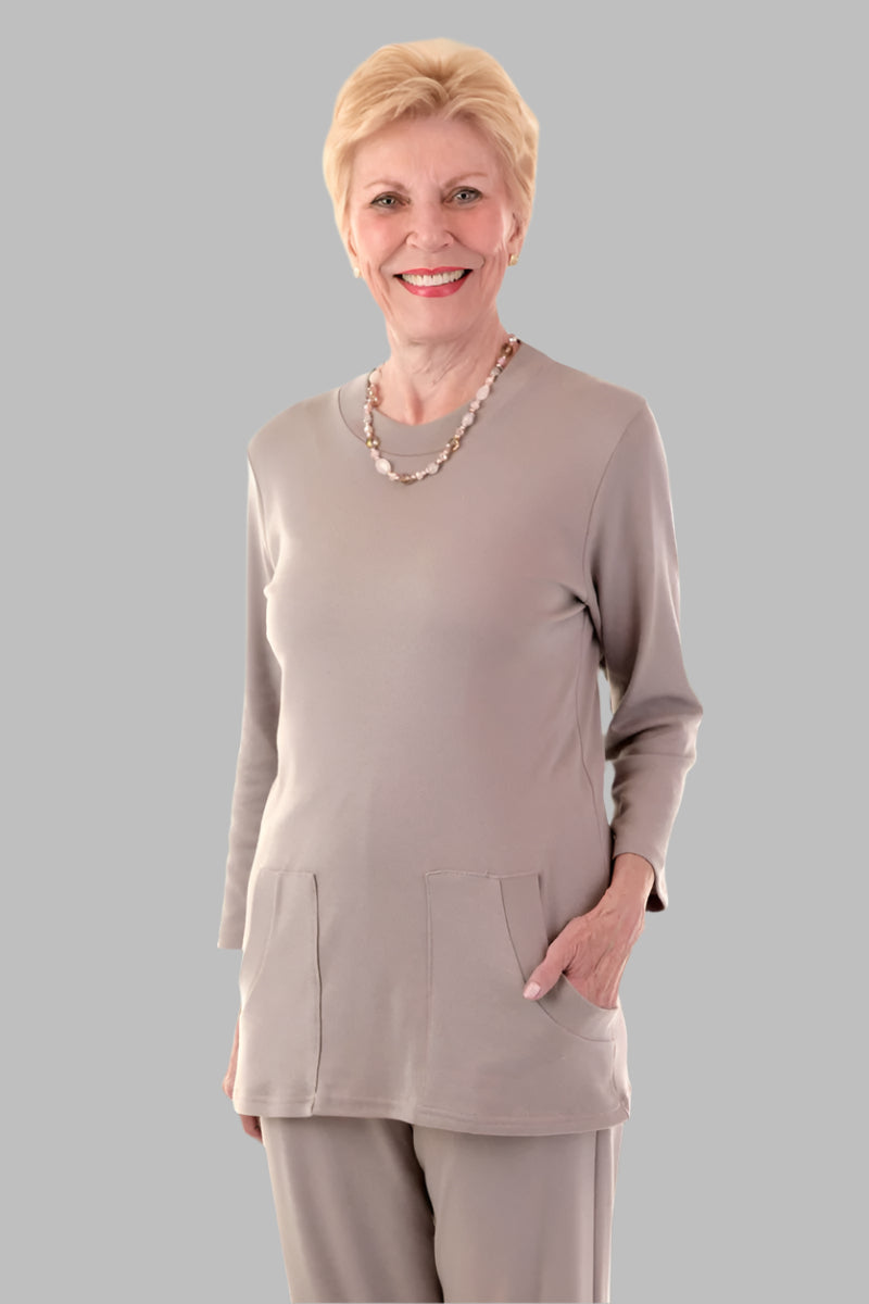 Solid Moon Pocket Wrap Back Top for women by Buck & Buck, and available in different sizes. This tops item is part of our blouses collection.