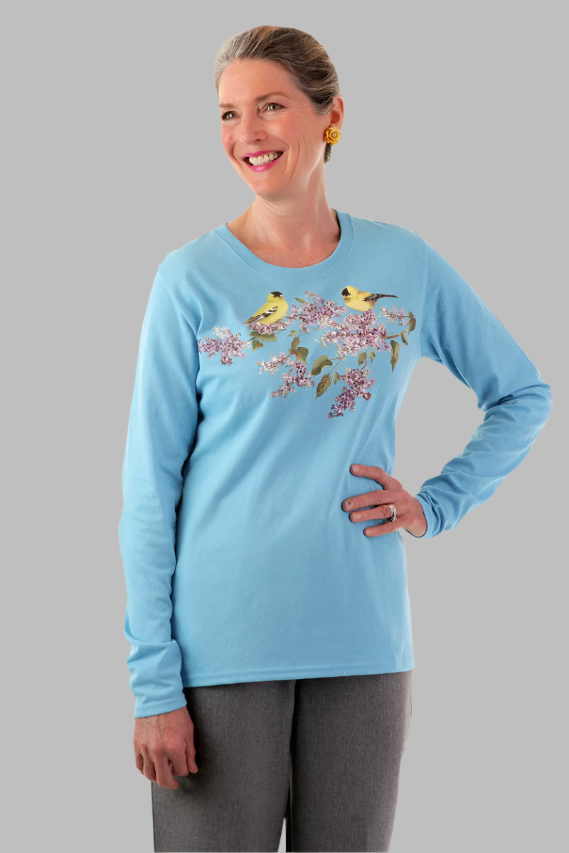 Women's Long Sleeve Printed T-Shirt by Buck & Buck in Turquoise, and available in different sizes. This tops item is part of our t-shirts collection.
