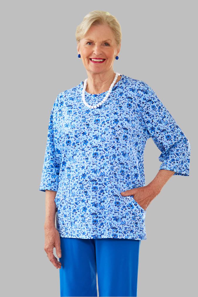 Printed Moon Pocket Wrap Back Top for women by Buck & Buck, and available in different sizes. This tops item is part of our blouses collection.