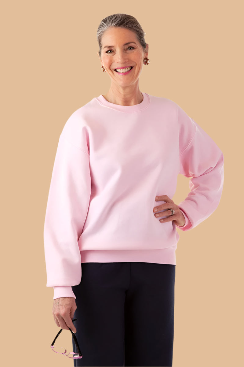 Women's Basic Sweat Top by Buck & Buck in Pink, and available in different sizes. This tops item is part of our sweatshirts collection.