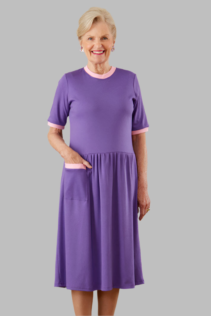 Short Sleeve Solid Knit Snap Back Dress for women by Buck & Buck in Medium Blue, and available in different sizes. This bottoms item is part of our dresses collection.