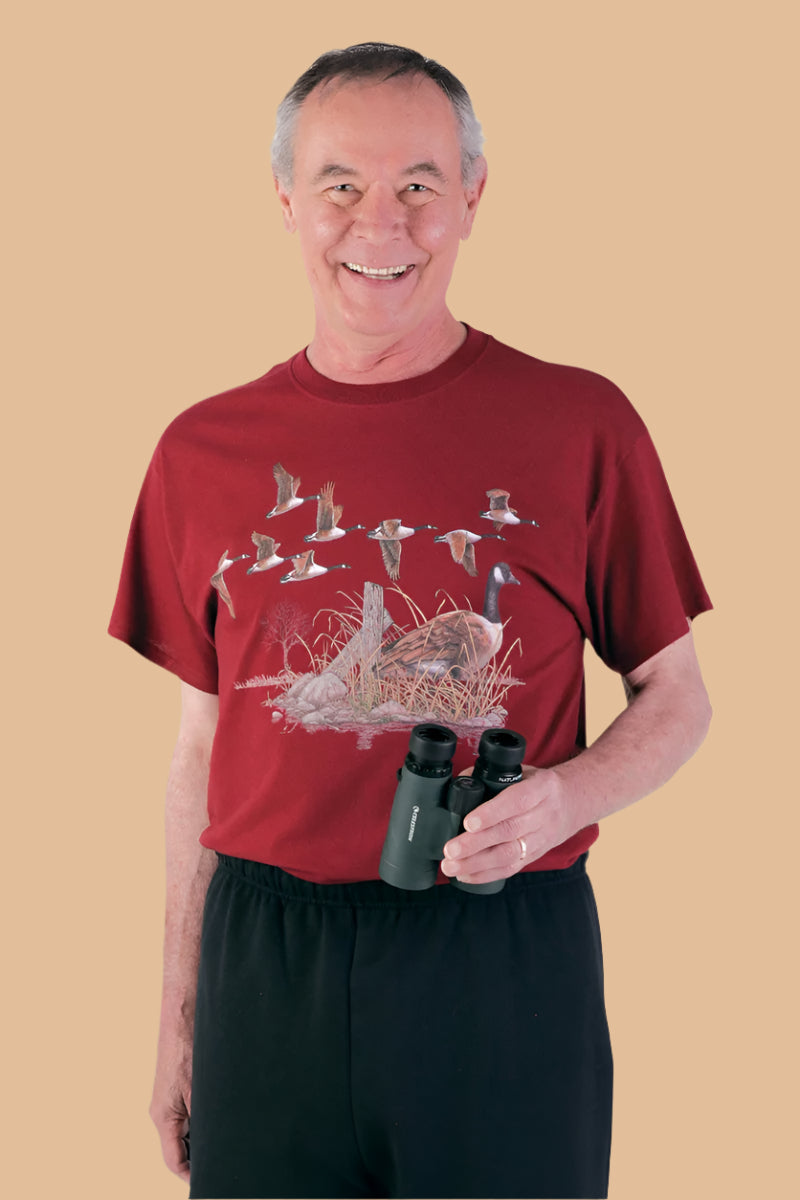 Men's Short Sleeve Printed Snap Back T-Shirt by Buck & Buck, and available in different sizes. This tops item is part of our t-shirts collection.