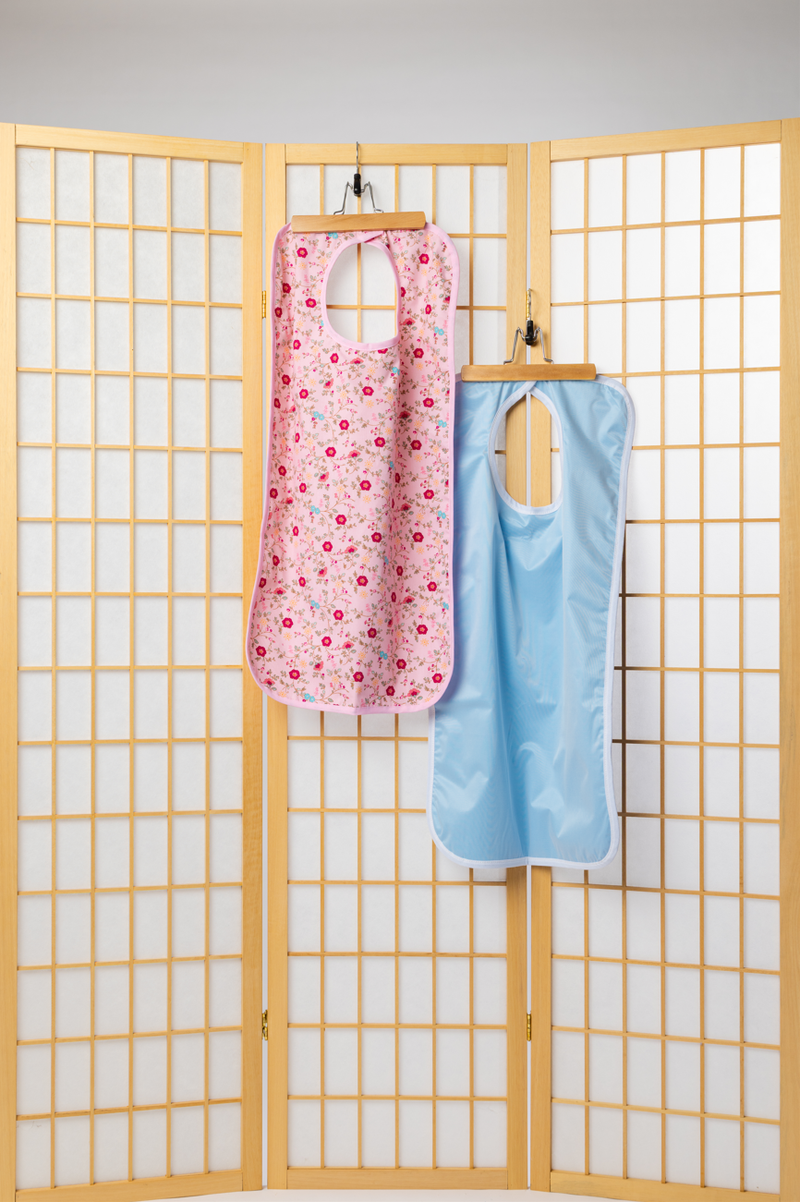 Women's Waterproof Floral Bib by Buck & Buck, and available only in a one-size option. This accessories & home item is part of our bibs collection.