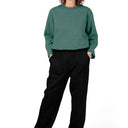 Women's Long Sleeve Fleece Jumpsuit by Buck & Buck in Green Top/Black Pants, and available in different sizes. This one-piece garments item is part of our one-pieces collection.