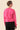 Women's Two-Tone Jumpsuit by Buck & Buck with fuchsia top/black pants, and available in different sizes. This one-piece garments item is part of our one-pieces collection.