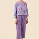 Capri Perfect Fit Jumpsuit-Printed Top for women by Buck & Buck in lilac, and available in different sizes. This one-piece garments item is part of our one-pieces collection.