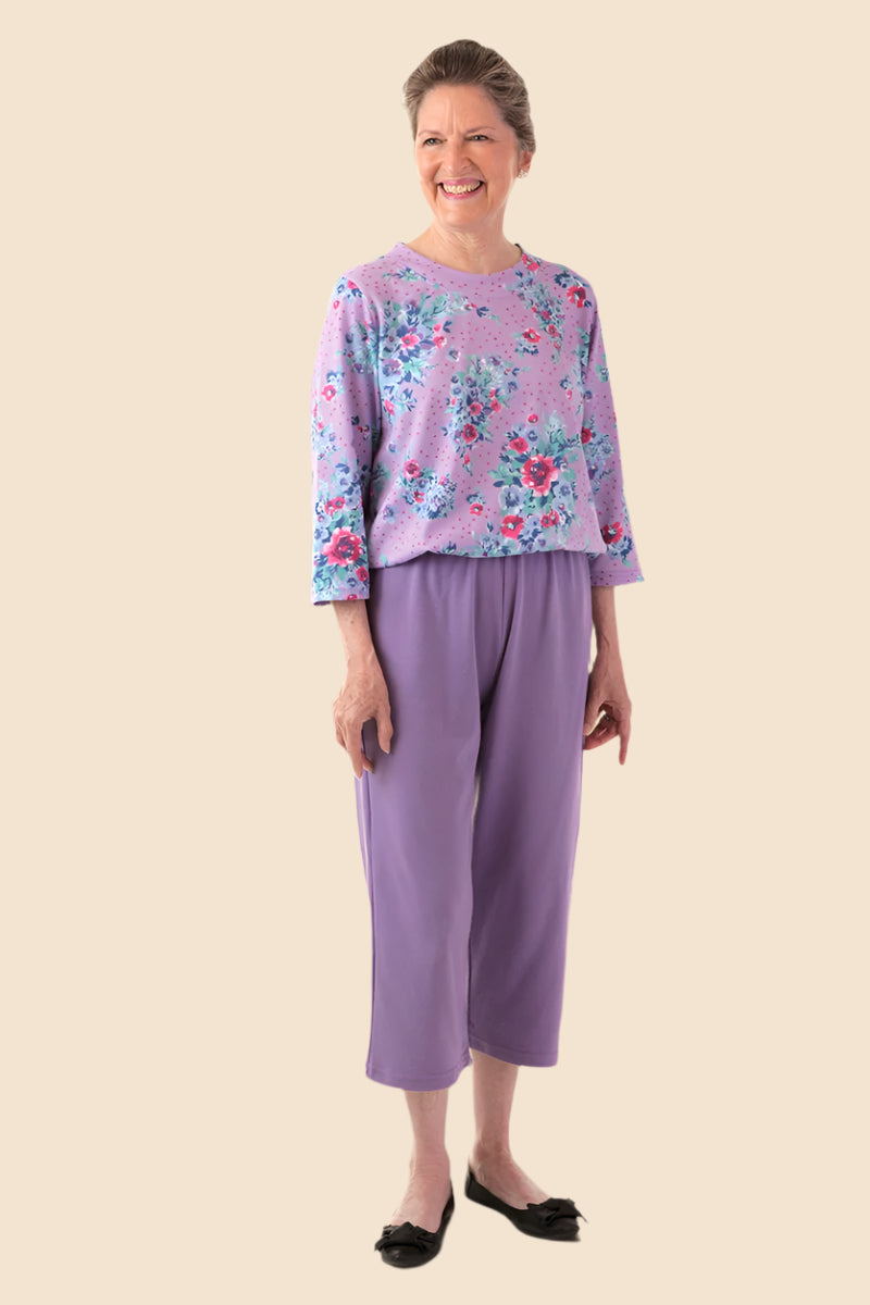Capri Perfect Fit Jumpsuit-Printed Top for women by Buck & Buck in lilac, and available in different sizes. This one-piece garments item is part of our one-pieces collection.
