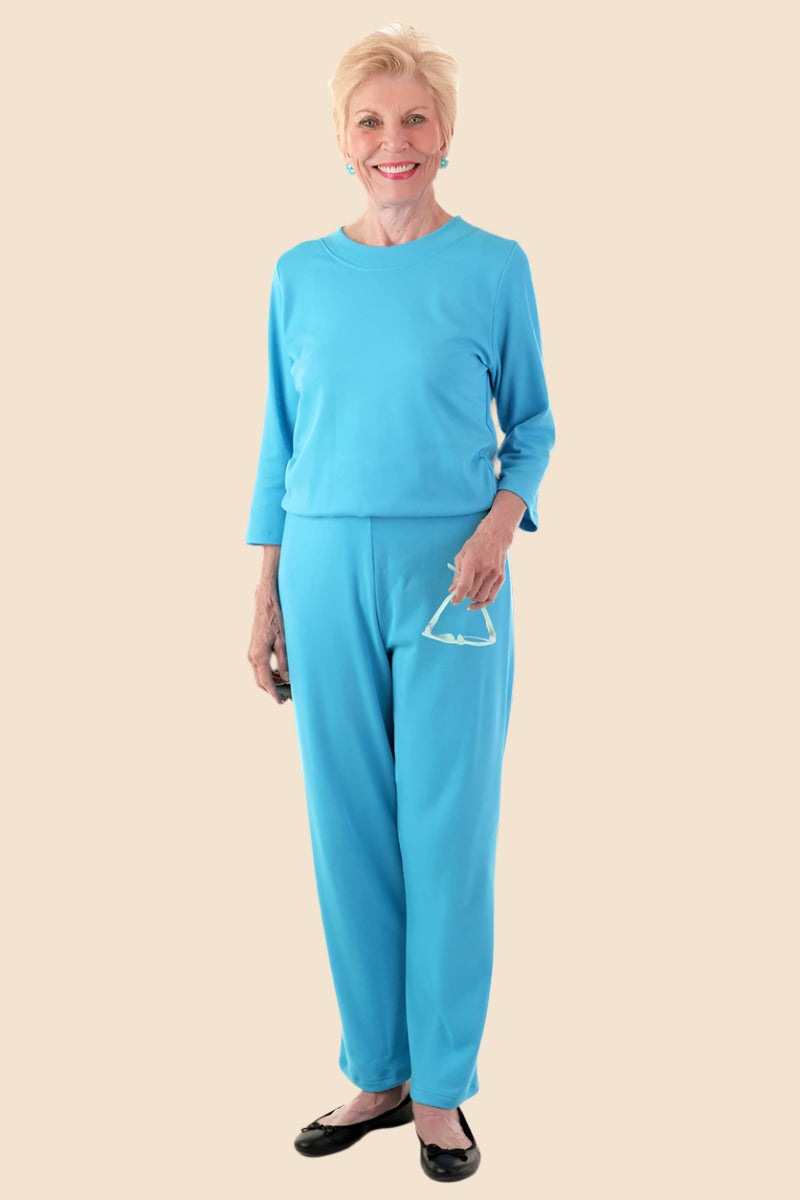 Women's Basic Perfect-Fit Jumpsuit by Buck & Buck in Turquoise, and available in different sizes. This one-piece garments item is part of our one-pieces collection.