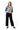 Women's Tunic Jumpsuit by Buck & Buck in White Top/Black Pants, and available in different sizes. This one-piece garments item is part of our one-pieces collection.