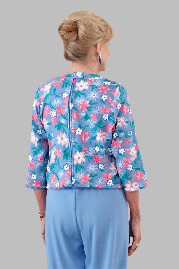 Printed Top Perfect Fit Jumpsuit for women by Buck & Buck in medium blue, and available in different sizes. This one-piece garments item is part of our one-pieces collection.