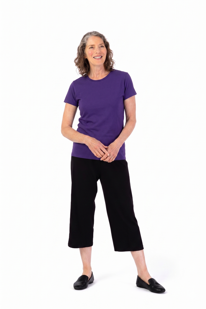 Women's Short Sleeve Solid T-Shirt by Buck & Buck in purple, and available in different sizes. This tops item is part of our t-shirts collection.