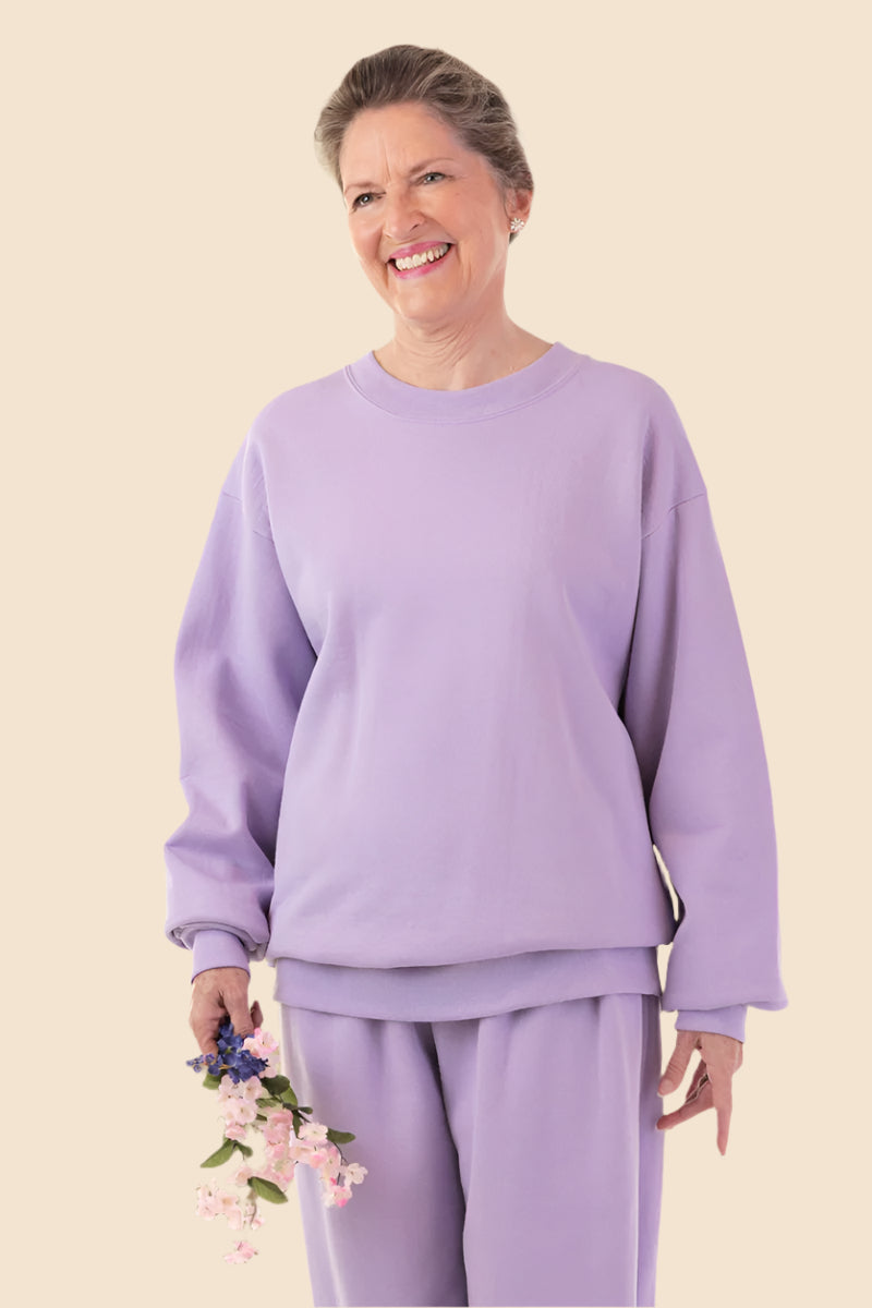 Women's Basic Wrap Back Sweat Top by Buck & Buck in Lilac, and available in different sizes. This tops item is part of our sweatshirts collection.