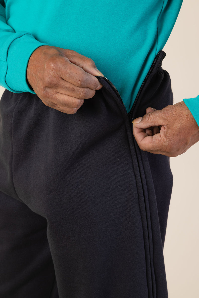 Men's Side Zip Sweatpants by Buck & Buck in Brown, and available in different sizes. This bottoms item is part of our sweatpants collection.