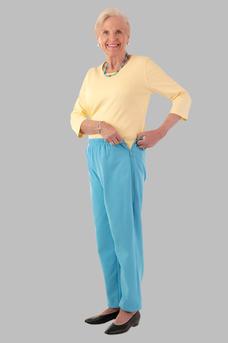 Women's Side Zip Sweatpants by Buck & Buck in Medium Blue, and available in different sizes. This bottoms item is part of our sweatpants collection.