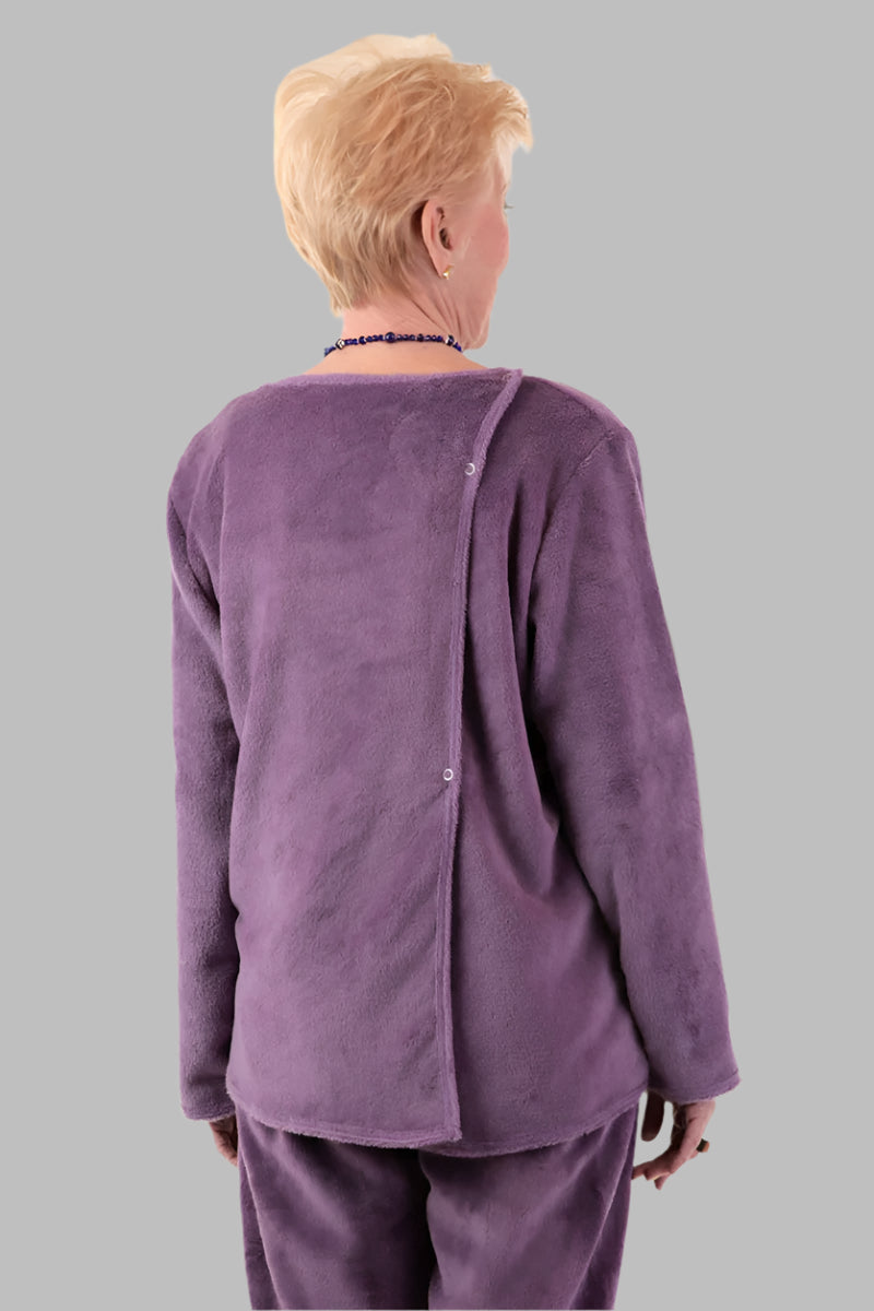 Pocketed So-Soft Wrap Back Top for women by Buck & Buck, and available in different sizes. This tops item is part of our tunics collection.